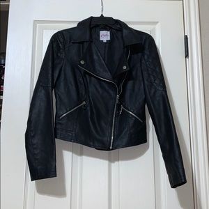 Candie’s Black leather Jacket with zipper pockets.